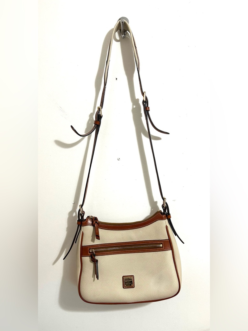 Authentic Dooney and Bourke crossbody, Cream with Brown